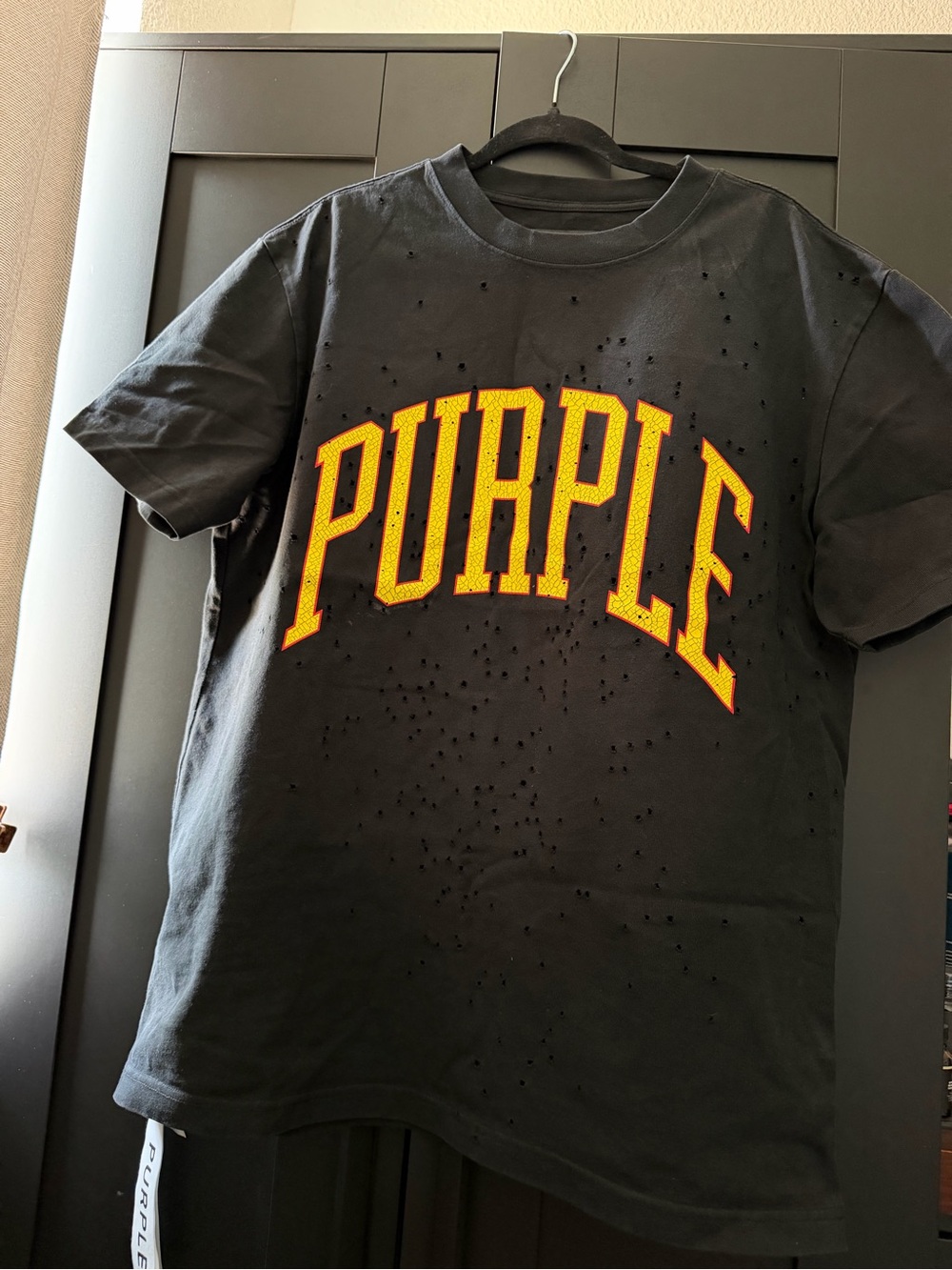 Black Graphic Tee with Yellow 'PURPLE' Logo